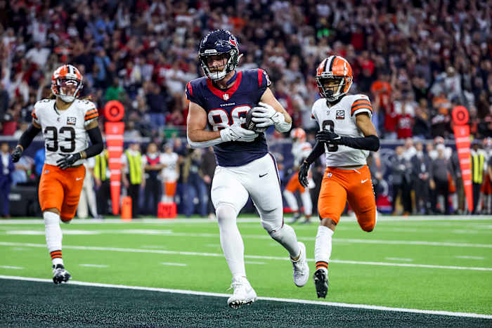 Jan 13, 2024; Houston, Texas, USA; Houston Texans tight end Dalton Schultz (86) scores a touch down during the second quarter in a 2024 AFC wild card game at NRG Stadium. Mandatory Credit: Troy Taormina-USA TODAY Sports